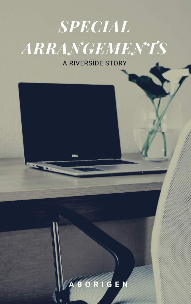An open laptop sits on a desk next to a vase of black flowers, before an unoccupied office chair