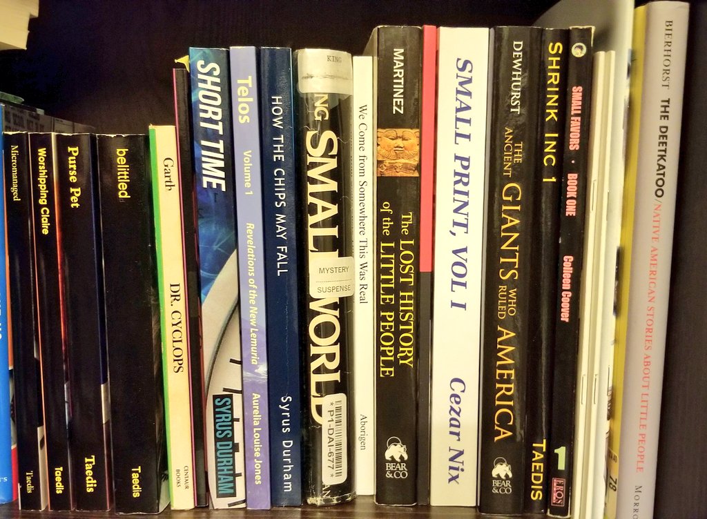 A shelf of novels by various Size authors